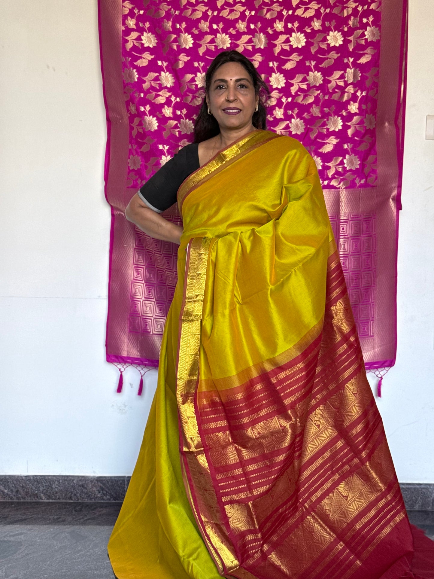 Yellow silk cotton saree with red pallu & border