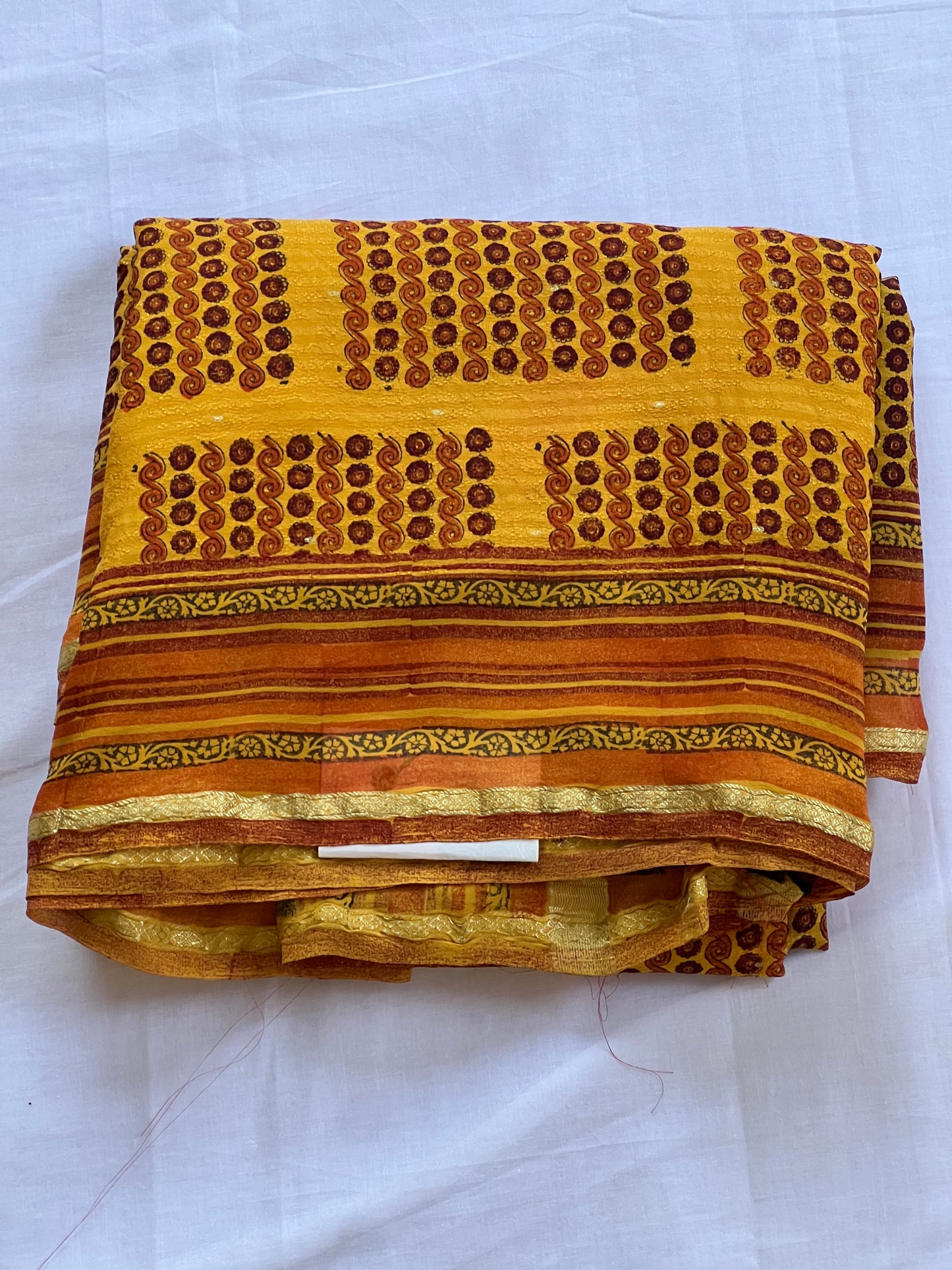 Mustard yellow crepe saree