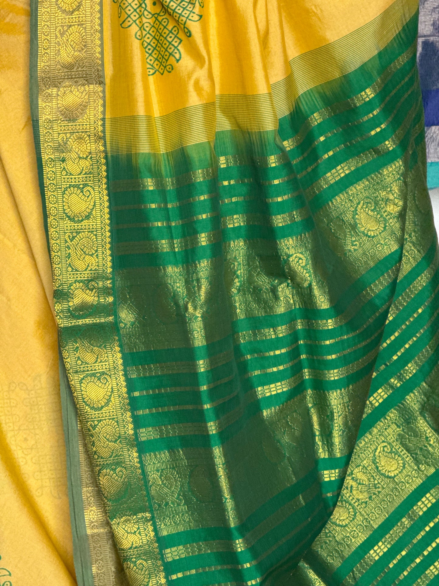 Yellow semi silk cotton saree with kolam print