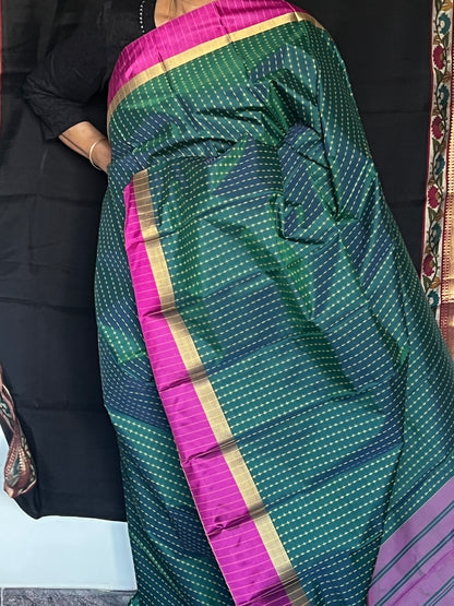 Bottle green and rani pink semi silk saree