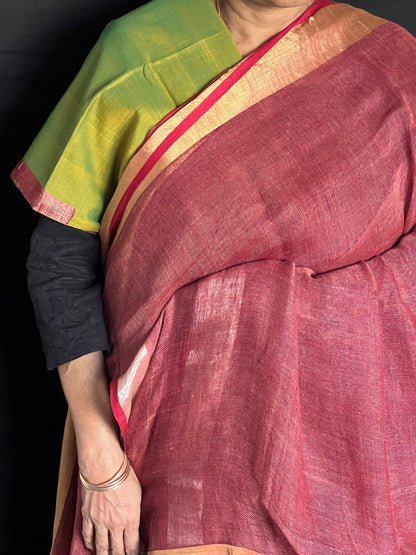 Brick red and green linen cotton saree