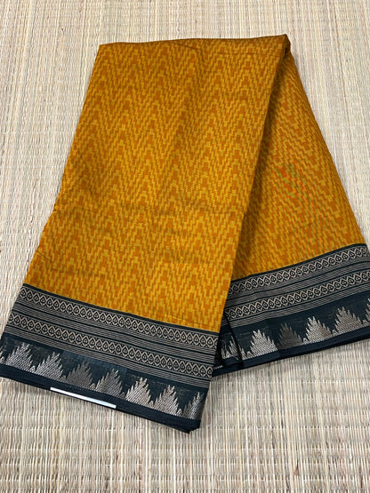 Mustard and black semi silk cotton saree