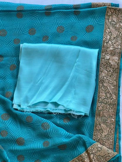 Blue georgette saree with jute border