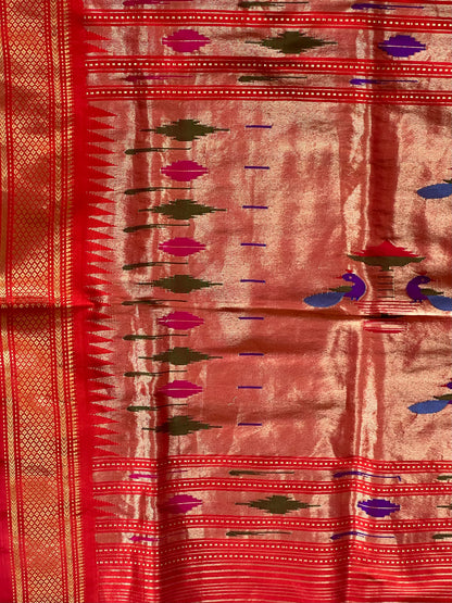 Bright red pure pythini silk saree