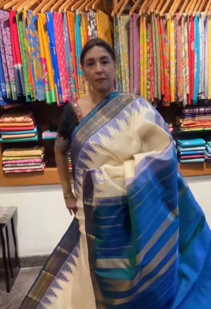 Off white korwai silk saree with contrast border