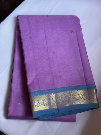 Lavender pure silk saree with blue border