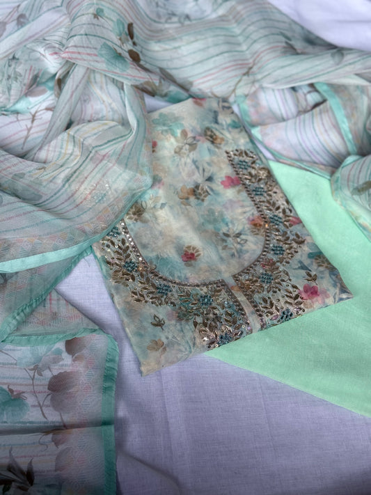 Unstitched pastel green salwar suit