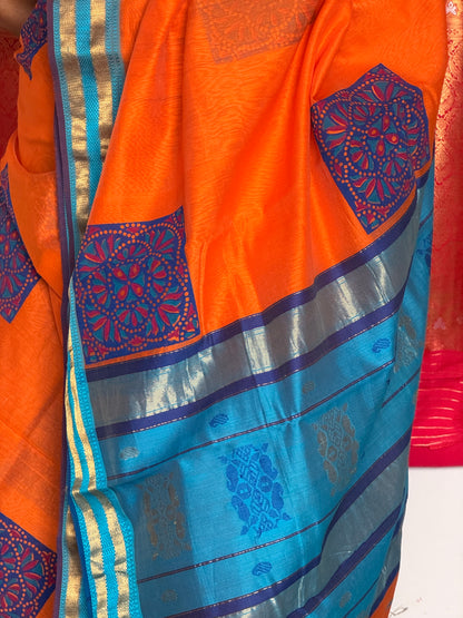Orange silk cotton saree with block print