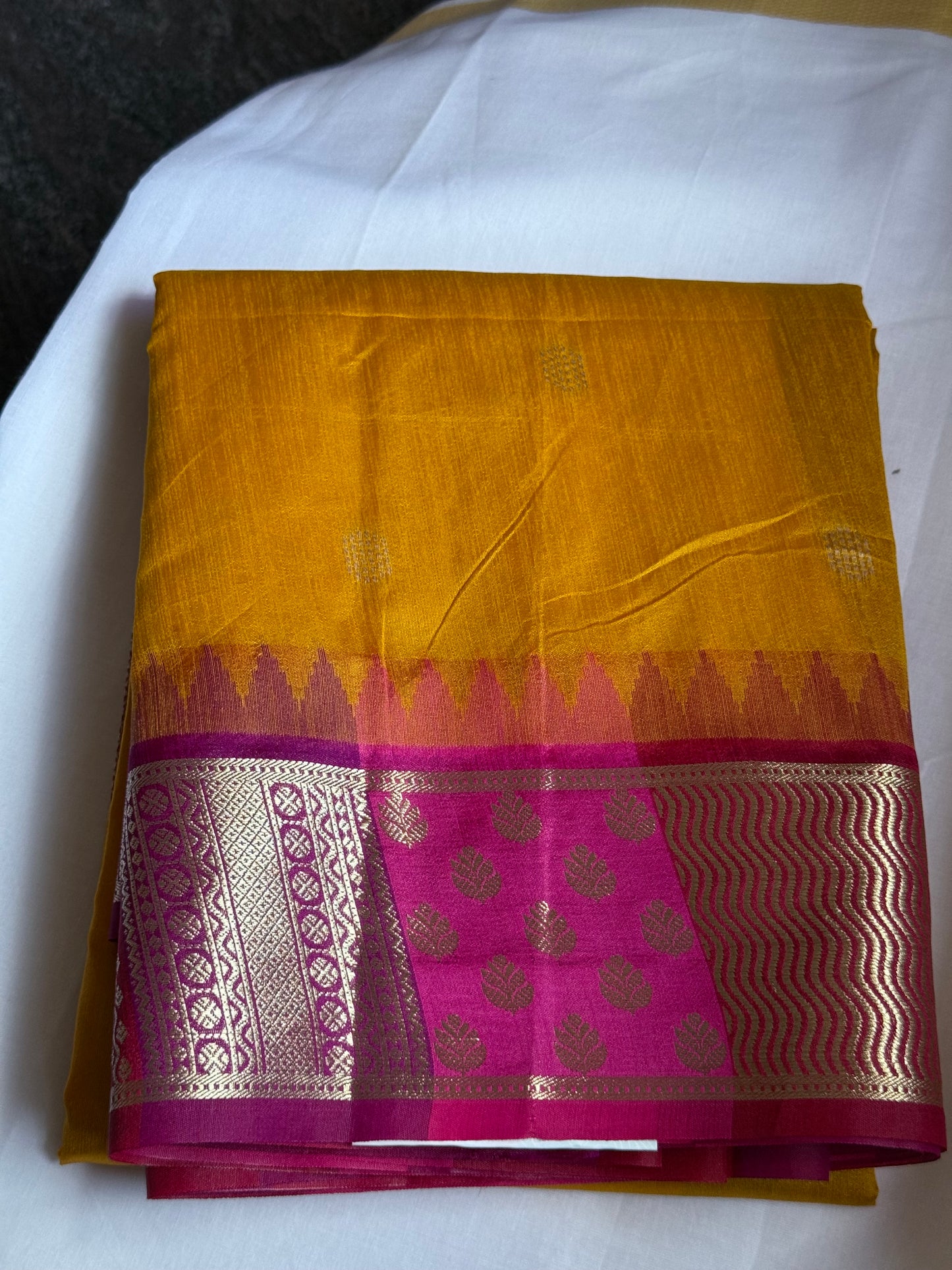 Yellow semi raw silk saree