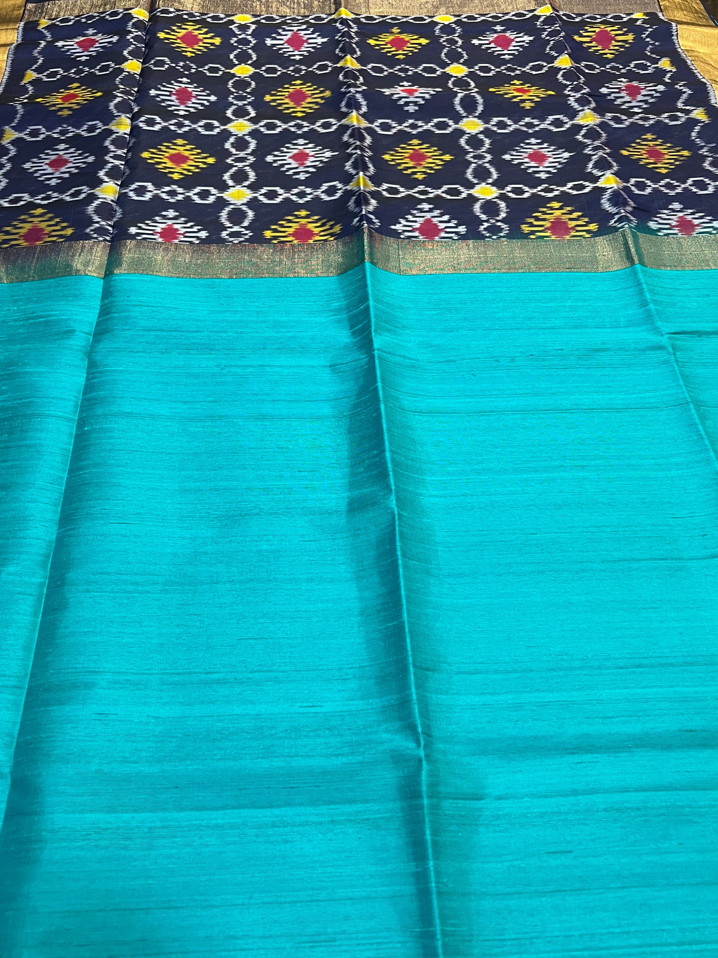Turquoise blue raw silk saree