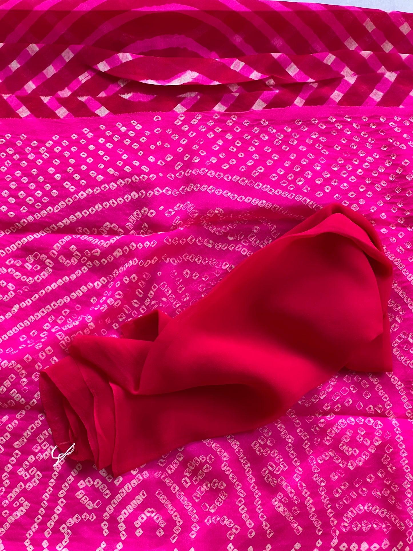 Pink pure chiffon bandini knotted saree