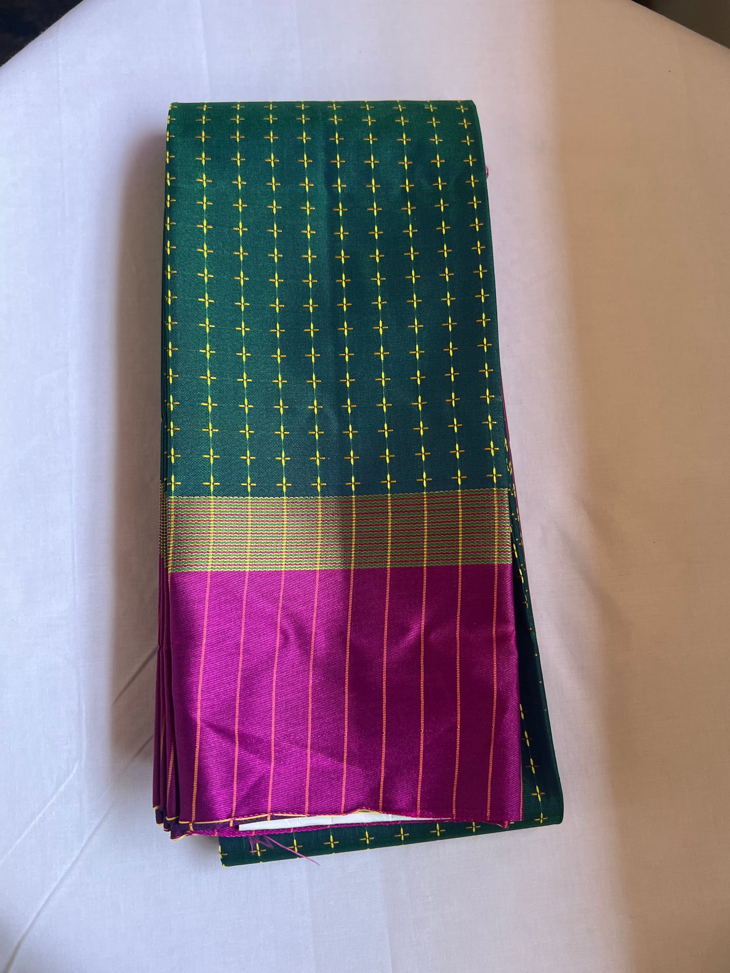 Bottle green and rani pink semi silk saree