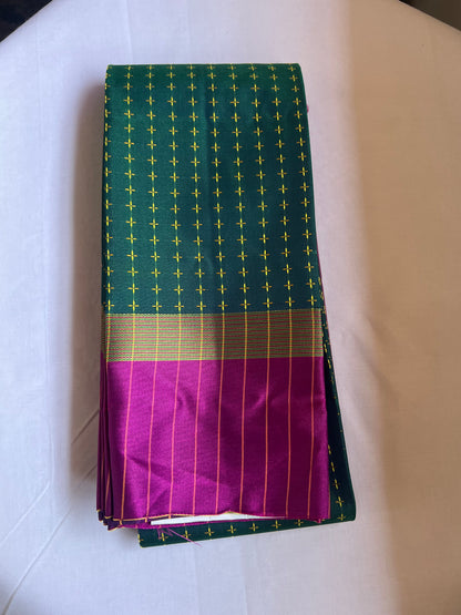 Bottle green and rani pink semi silk saree