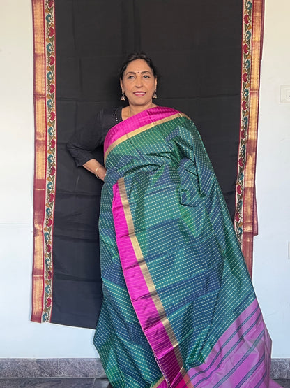 Bottle green and rani pink semi silk saree
