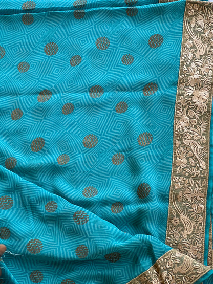 Blue georgette saree with jute border