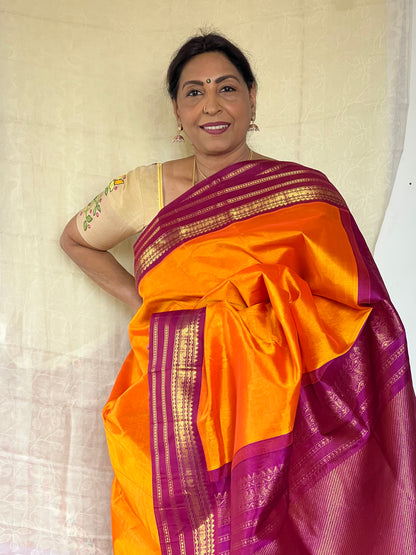 Mango Orange Magenta kanchivaram silk cotton saree