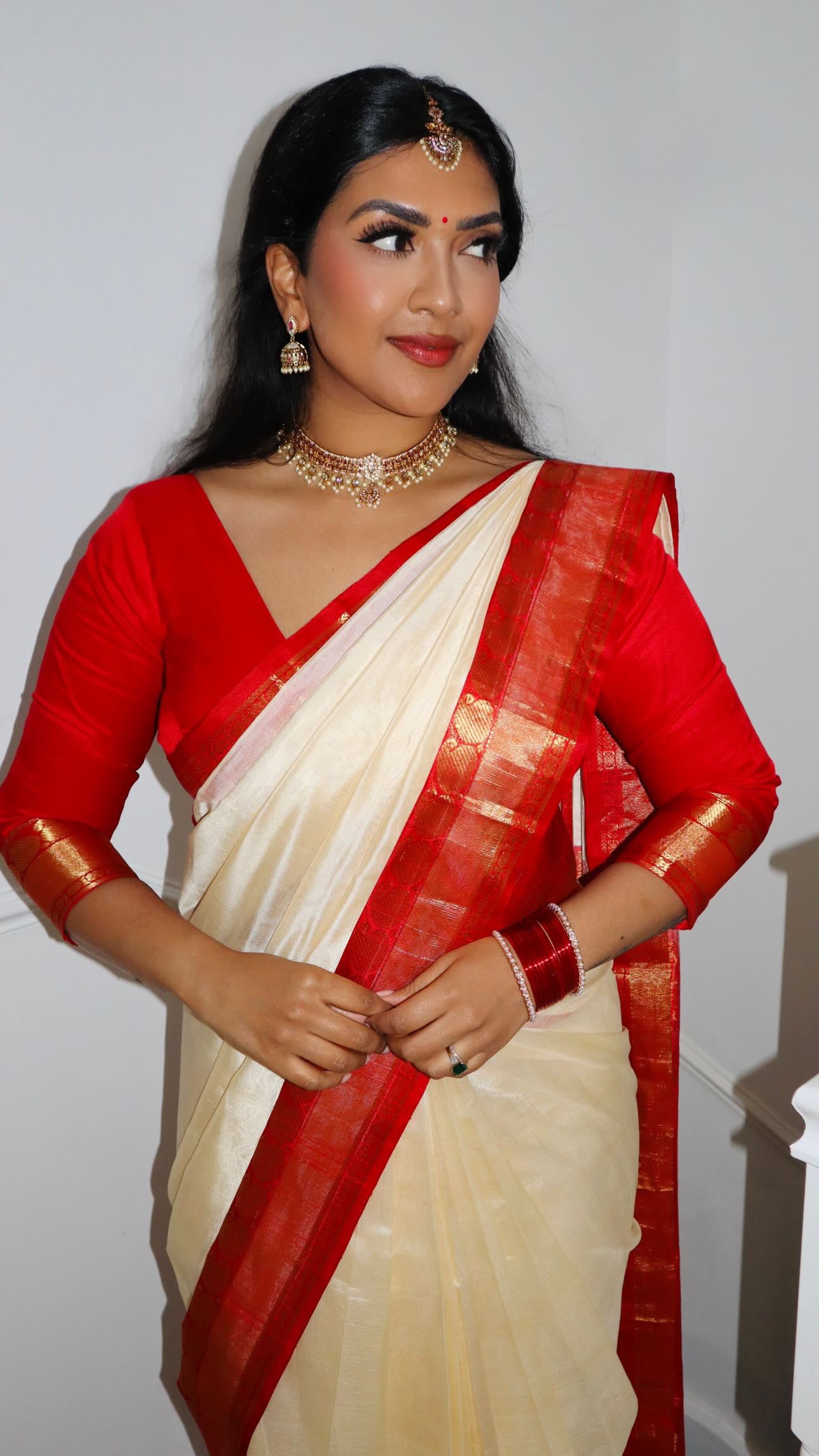 Cream and red kanchivaram silk cotton saree