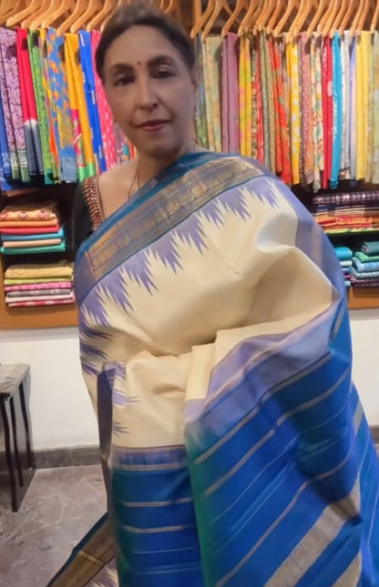 Off white korwai silk saree with contrast border