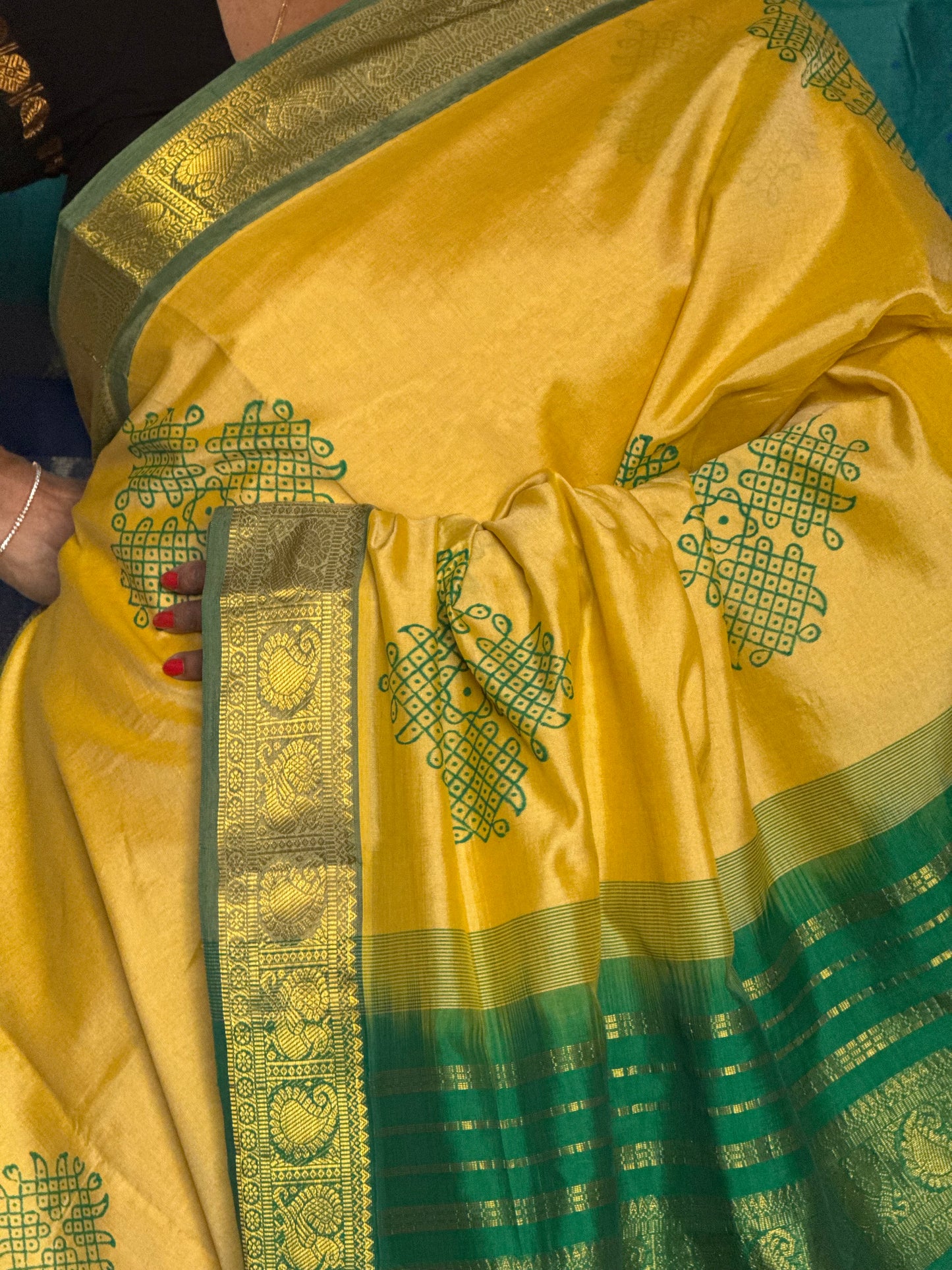 Yellow semi silk cotton saree with kolam print