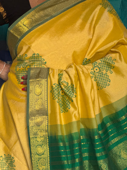 Yellow semi silk cotton saree with kolam print