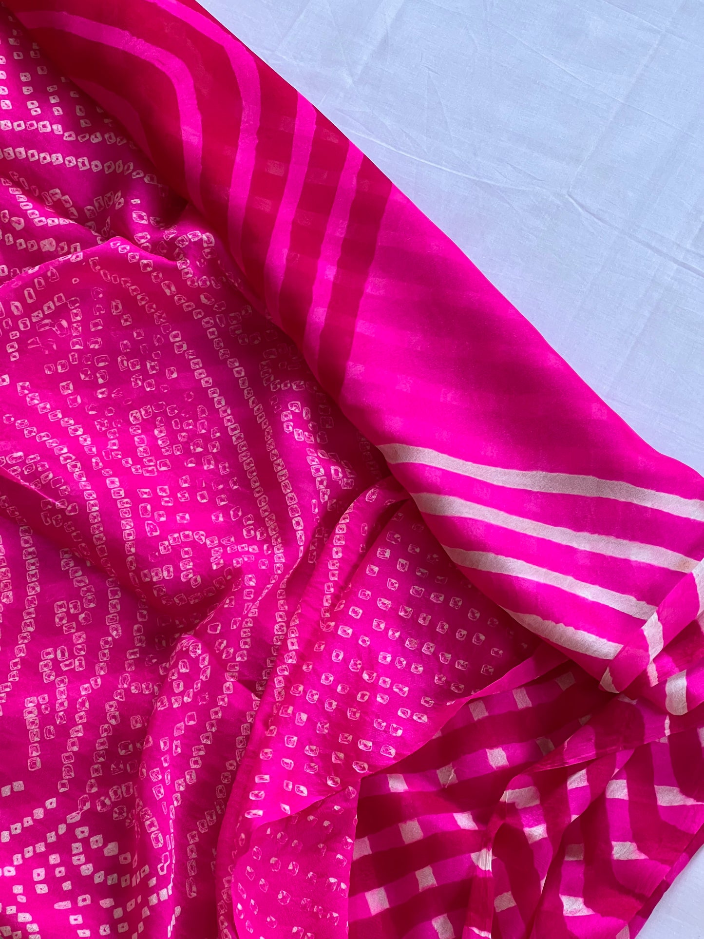 Pink pure chiffon bandini knotted saree