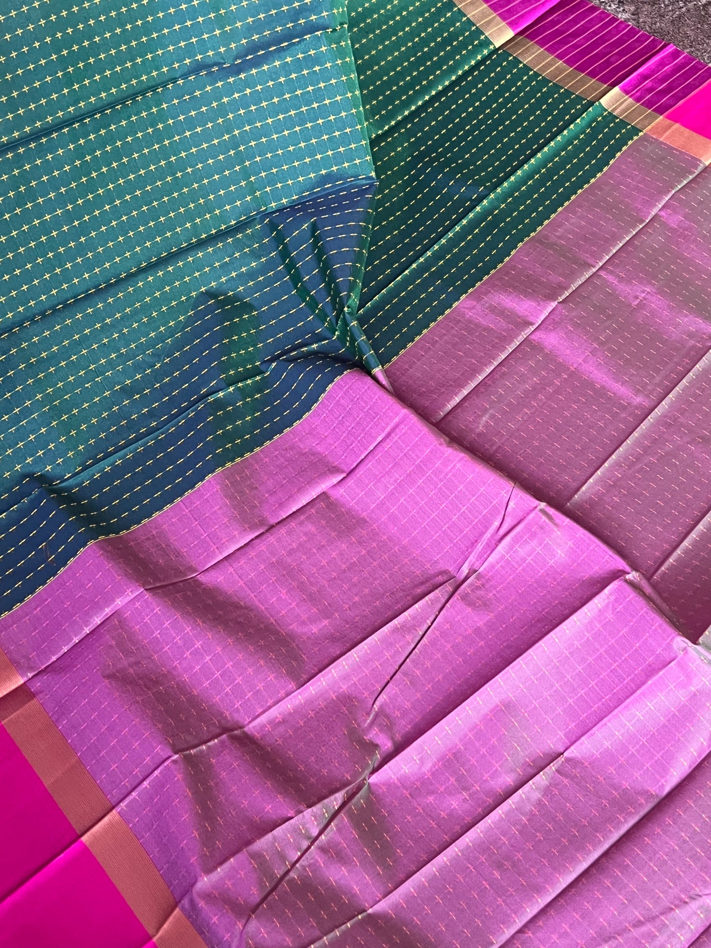 Bottle green and rani pink semi silk saree