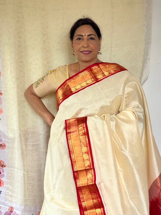Cream white Kanchivaram silk cotton saree