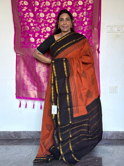 Orange and black sungudi saree