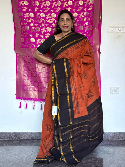 Orange and black sungudi saree