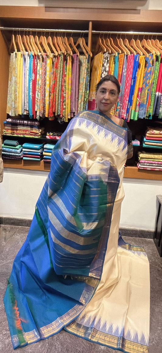 Off white korwai silk saree with contrast border