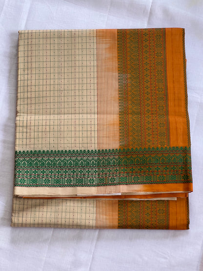 Checked orange semi silk cotton